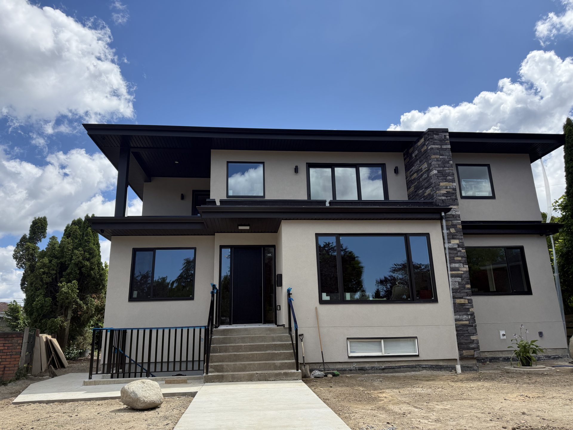 A finished two-storey home in Vancouver, built by CoreVal Homes